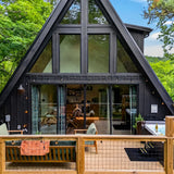 A-frame cabin front with deck